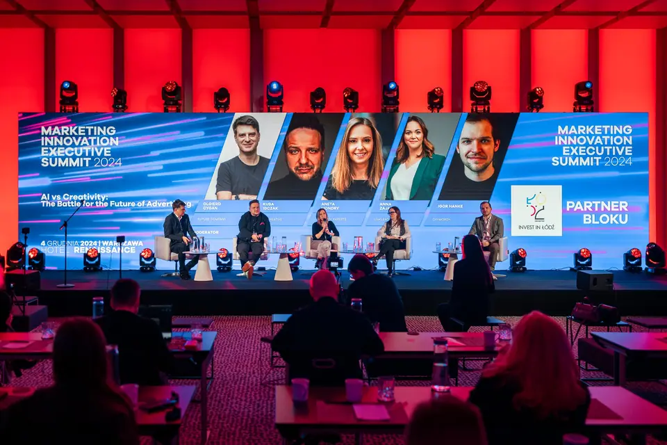 The panel „AI vs Creativity: The Battle for the Future of Advertising” – the block partner Invest in Łódź logo on screen, EXS 2024